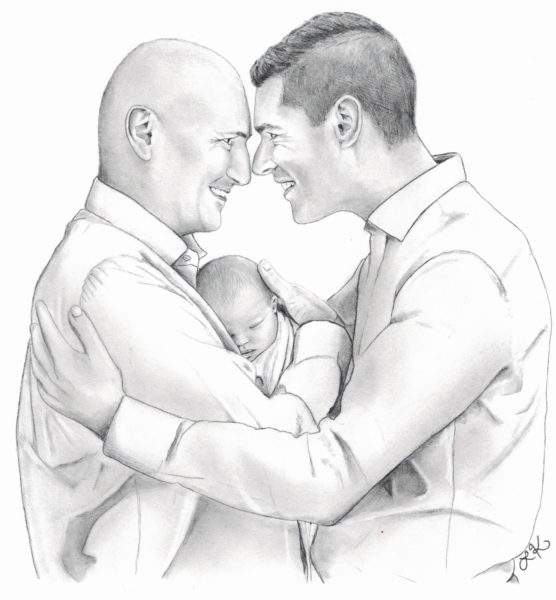 Fathers touching foreheads embracing newborn