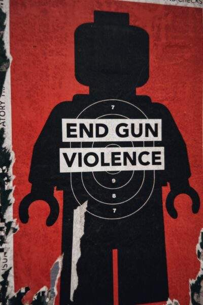 lego figurine silhouette gun range poster, "end gun violence"